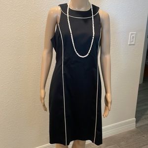 Black dress with white piping